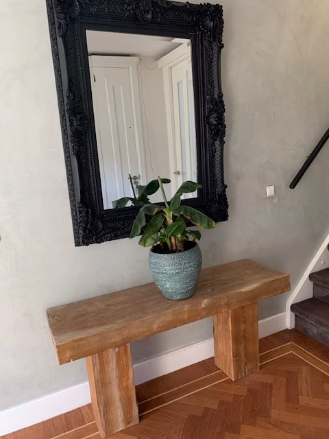 Beton cire wand met spiegel